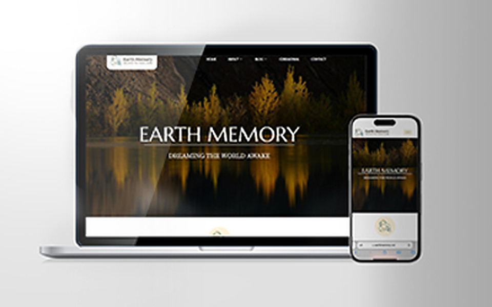 The Earth Memory website, shown on a laptop and a phone
