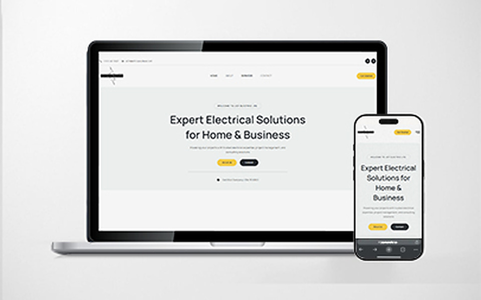 The JCP Electric website, shown on a laptop and a phone